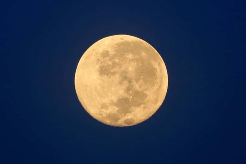 Full moon on blue background